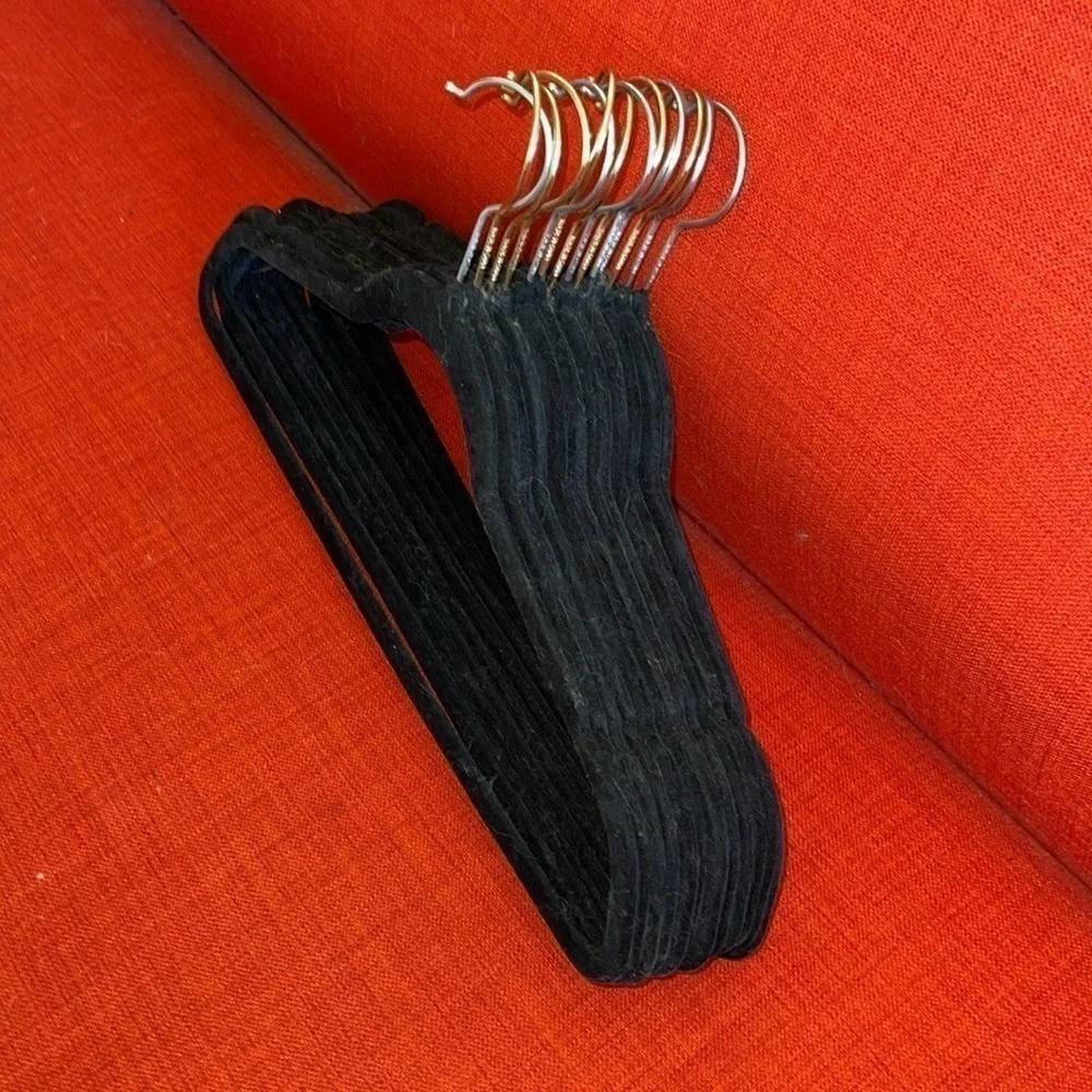 14 hangers stored never used some link which I can remove since made with grip